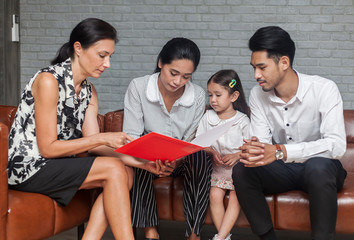 teacher telling about her child behavior to the parents