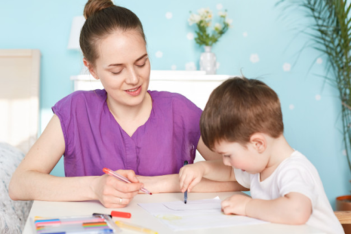 Kid who is learning slow and parent helping him 