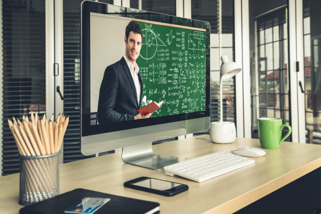Teacher using videos to present to kids