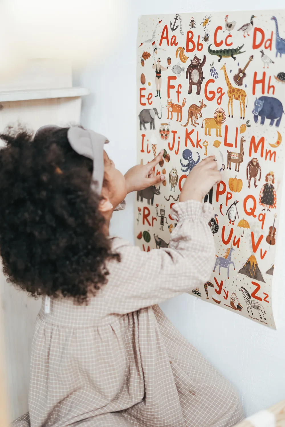 child learning abcd