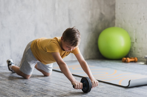 Boy doing exercise in the morning 