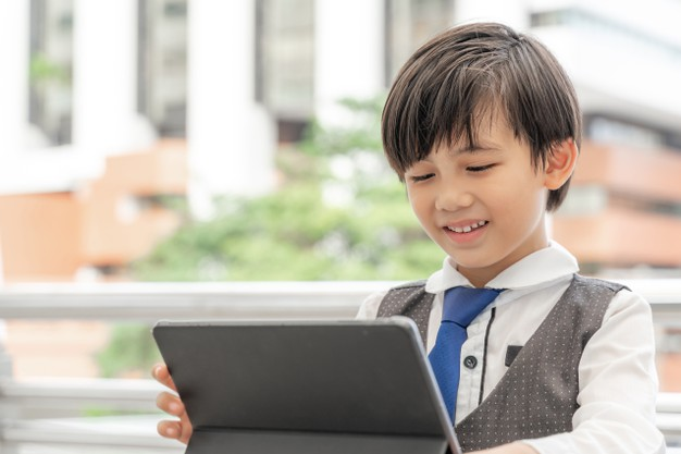 Kid studying multiplication table 