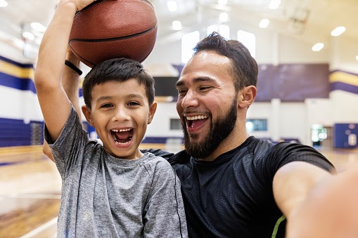 parent child relationship- playing basketball