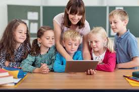 teacher taking class with the help of videos and images on a tablet