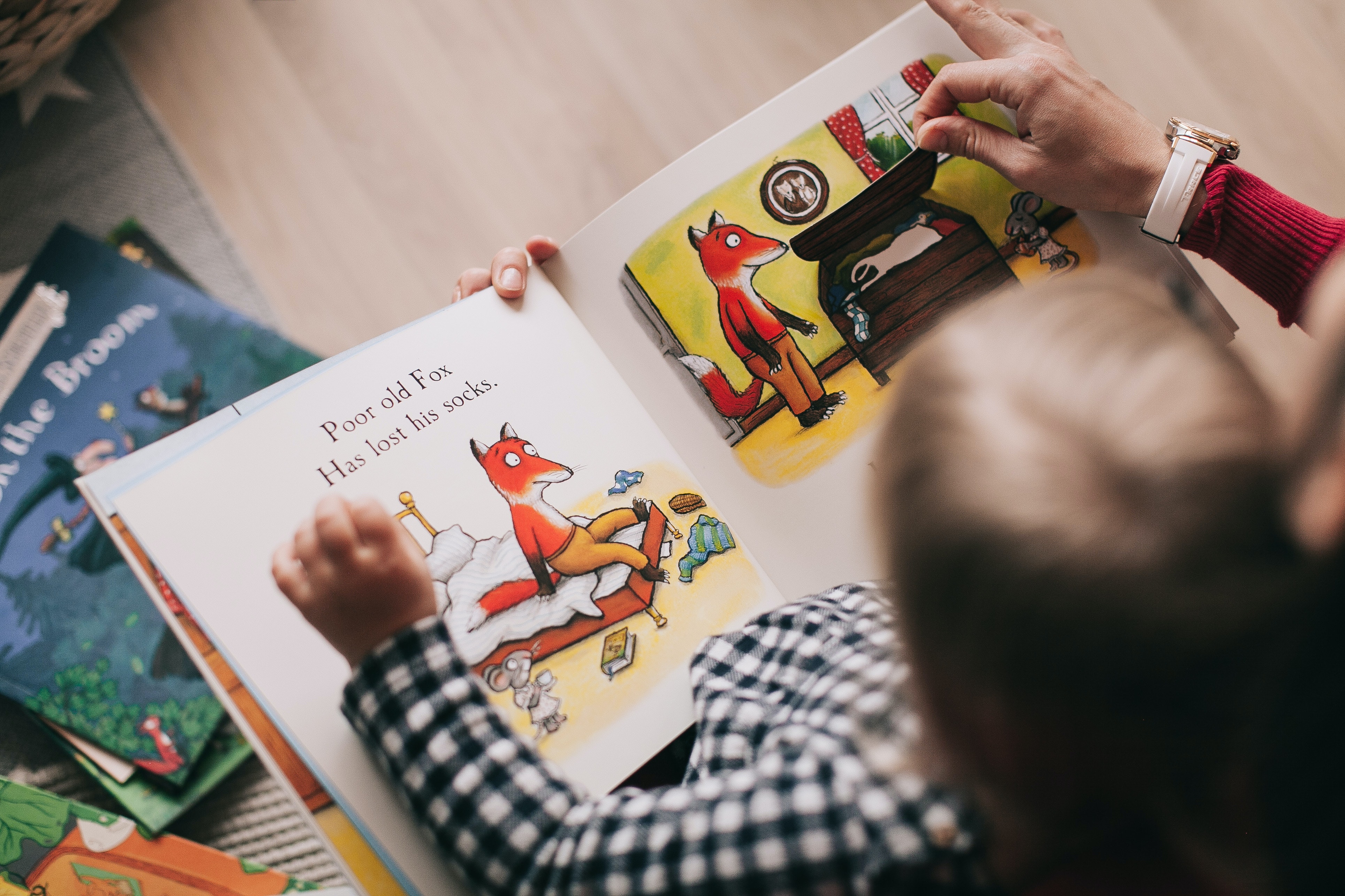 A kid reading a comic book