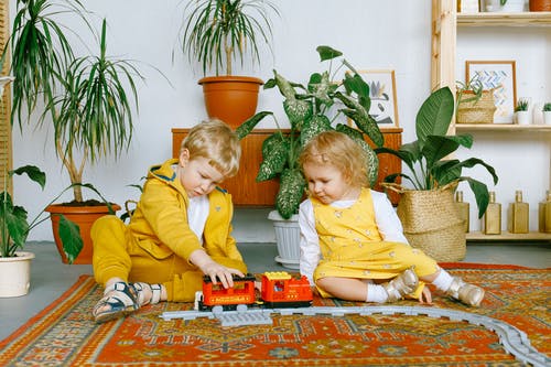 2 kids playing with interesting toys to find their passion for kids