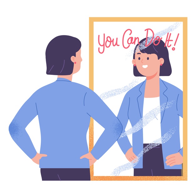 Young woman standing in front of mirror motivating and confident on herself